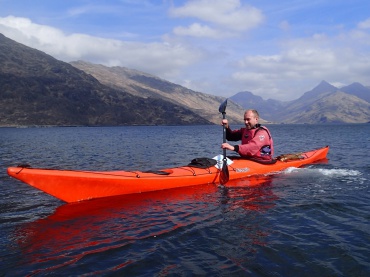 Sea Kayaker in Loch Nevis, Knoydart.