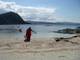 Heading up the beach at the end of the days kayaking, Ardnamurchan trip.